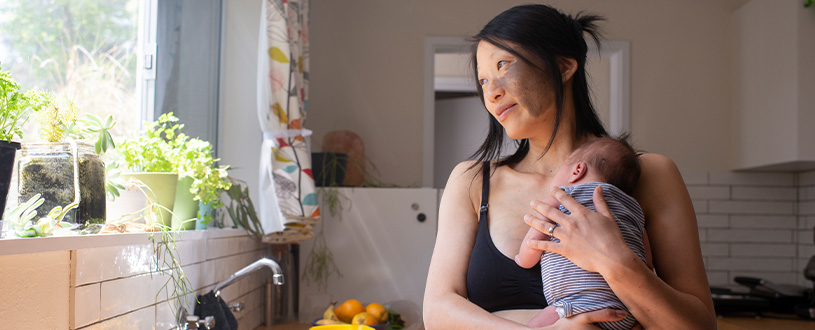 Woman holding her baby