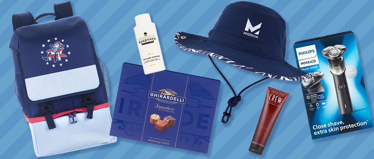 Backpack, Dandymen Texture Powder, Ghirardelli chocolates, blue Mission bucket hat, American Crew styling gel and Philips Norelco shaver