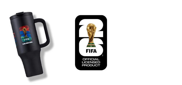 FIFA World Cup–themed products including a black travel tumbler, branded baseball cap, official FIFA licensed product logo and soccer ball displayed on a green grass background.