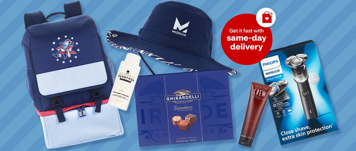 Backpack, Dandymen Texture Powder, Ghirardelli chocolates, blue Mission bucket hat, American Crew styling gel and Philips Norelco shaver