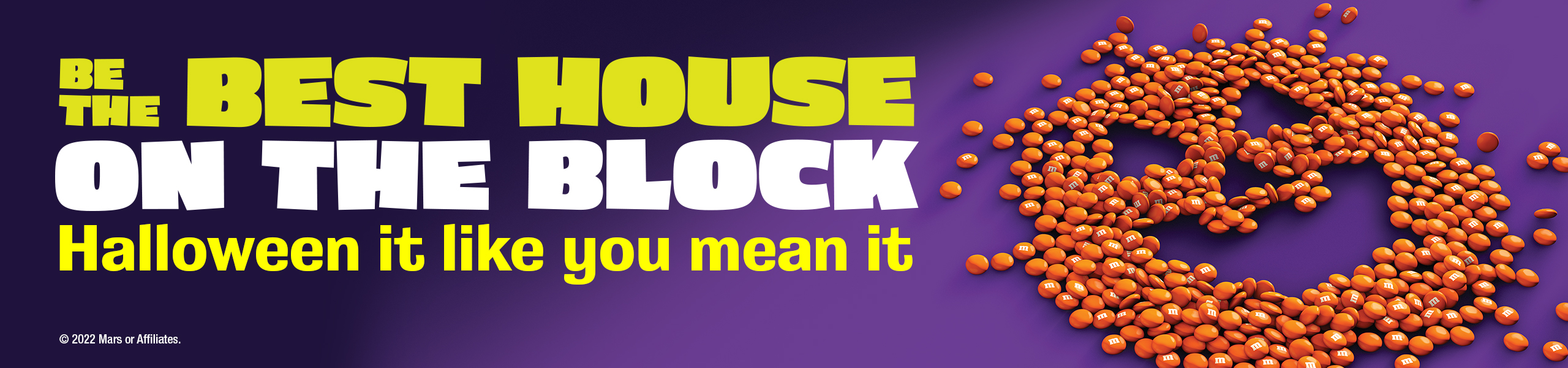 BE THE BEST HOUSE ON THE BLOCK Halloween it like you mean it Pumpkin face made of m & m's candies ©2022 Mars or Affiliates