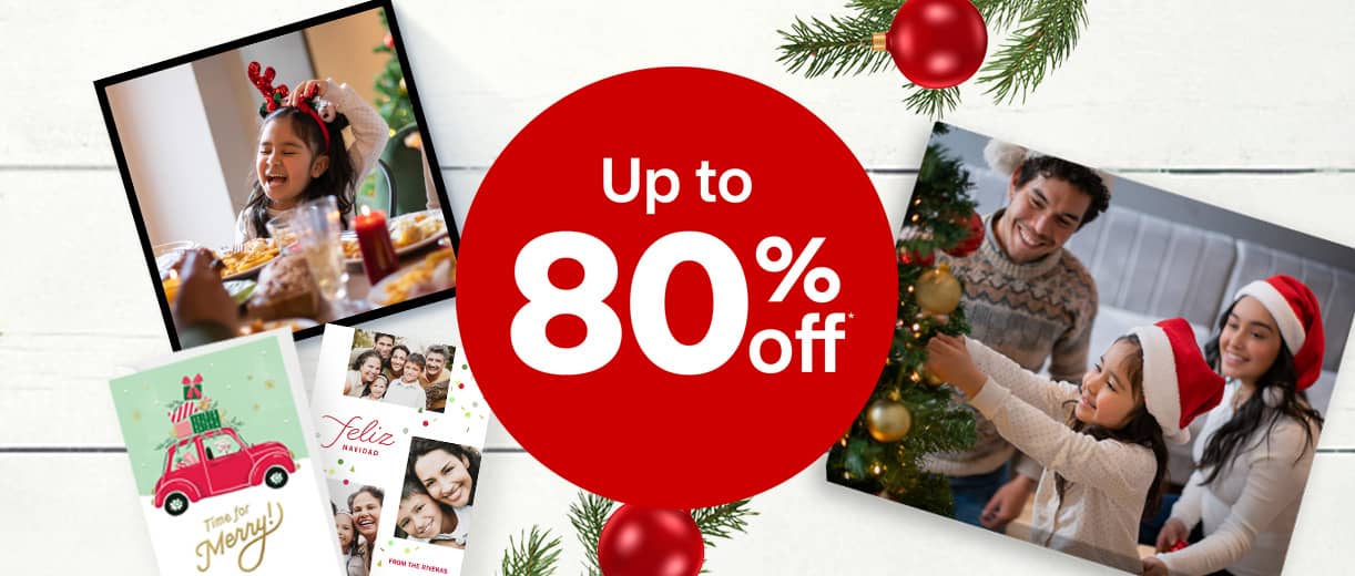 Holiday sale offer dot showing ‘Up to 80% off’ with festive family photos, cards and decorations.
