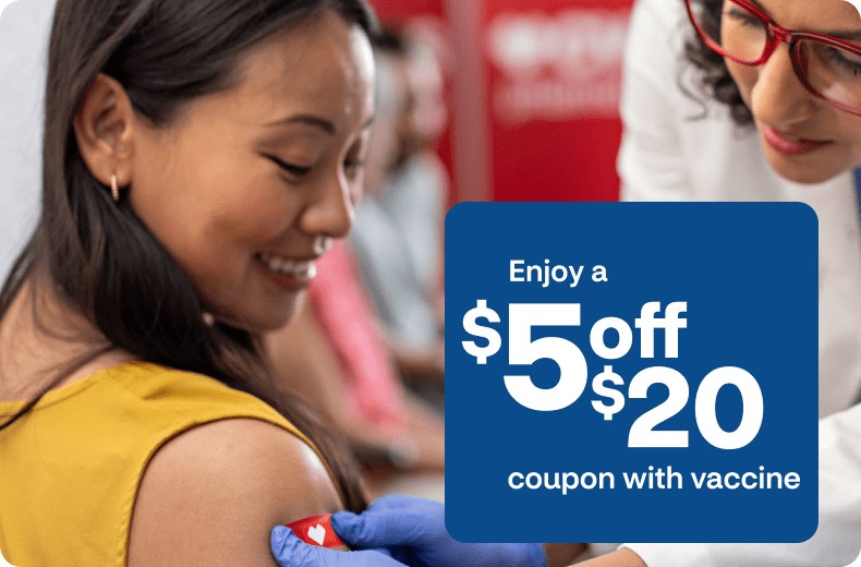 A patient is happy to get a bandage placed on their arm after a successful vaccination. Enjoy a $5 off $20 coupon with vaccine.