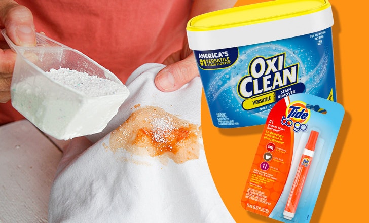 Adult pours OxiClean stain remover on a stain on a white cloth next to an OxiClean container and Tide to Go pen
